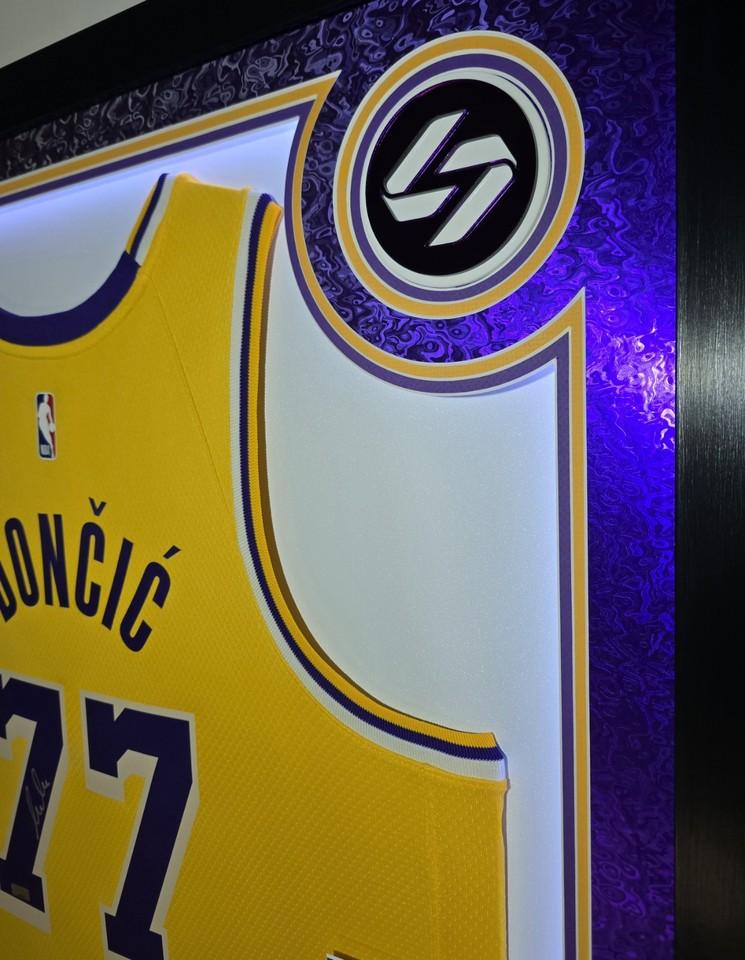 Luka Doncic Signed Lakers Custom Framed Nike Jersey with LED Display & (2) PSA 10 Graded Cards (Panini) at PristineAuction.com Luka Doncic Signed Lakers Custom Framed Nike Jersey with LED Display & (2) PSA 10 Graded Cards (Panini) at PristineAuction.com