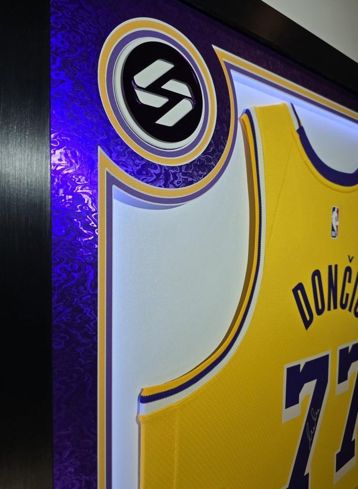 Luka Doncic Signed Lakers Custom Framed Nike Jersey with LED Display & (2) PSA 10 Graded Cards (Panini) at PristineAuction.com Luka Doncic Signed Lakers Custom Framed Nike Jersey with LED Display & (2) PSA 10 Graded Cards (Panini) at PristineAuction.com