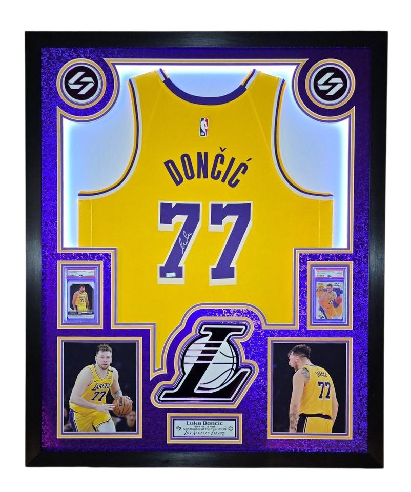 Luka Doncic Signed Lakers Custom Framed Nike Jersey with LED Display & (2) PSA 10 Graded Cards (Panini) at PristineAuction.com Luka Doncic Signed Lakers Custom Framed Nike Jersey with LED Display & (2) PSA 10 Graded Cards (Panini) at PristineAuction.com
