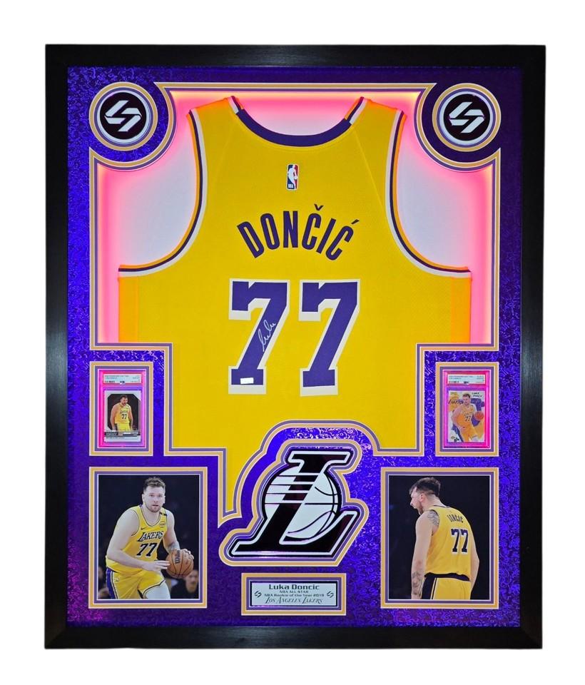 Luka Doncic Signed Lakers Custom Framed Nike Jersey with LED Display & (2) PSA 10 Graded Cards (Panini) at PristineAuction.com Luka Doncic Signed Lakers Custom Framed Nike Jersey with LED Display & (2) PSA 10 Graded Cards (Panini) at PristineAuction.com