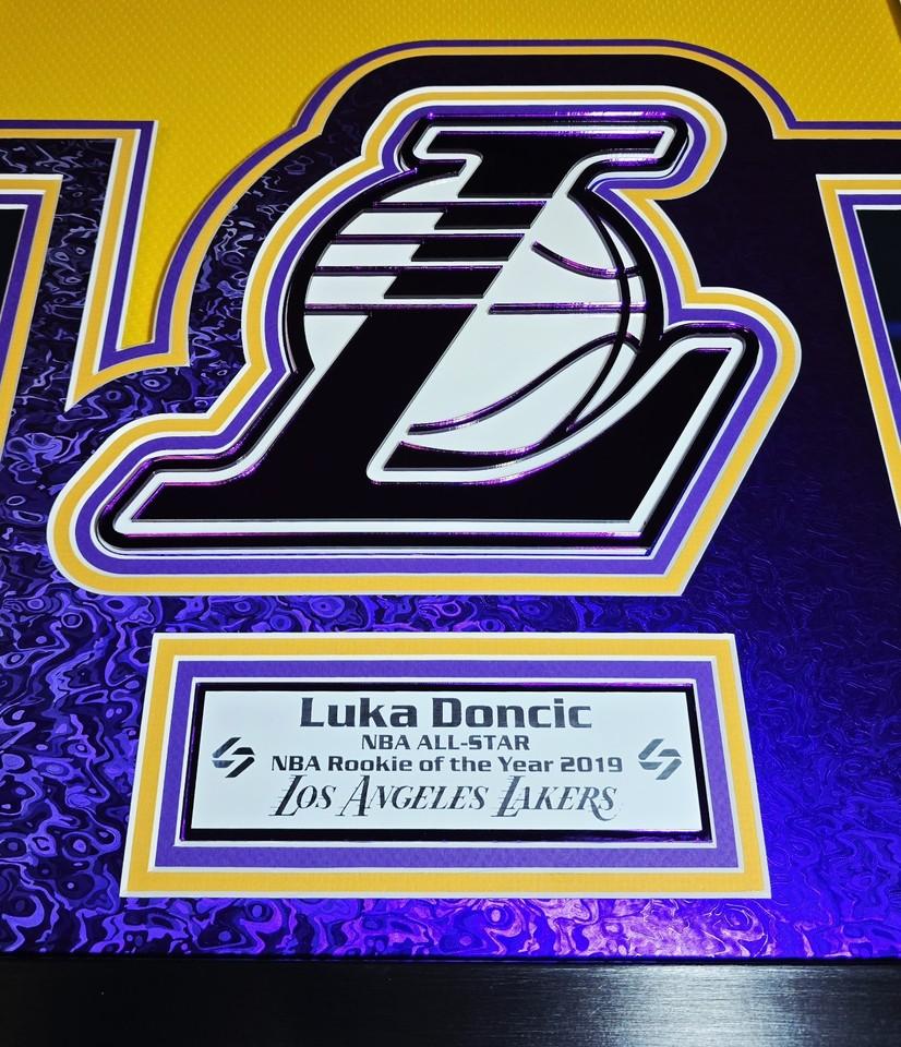 Luka Doncic Signed Lakers Custom Framed Nike Jersey with LED Display & (2) PSA 10 Graded Cards (Panini) at PristineAuction.com Luka Doncic Signed Lakers Custom Framed Nike Jersey with LED Display & (2) PSA 10 Graded Cards (Panini) at PristineAuction.com