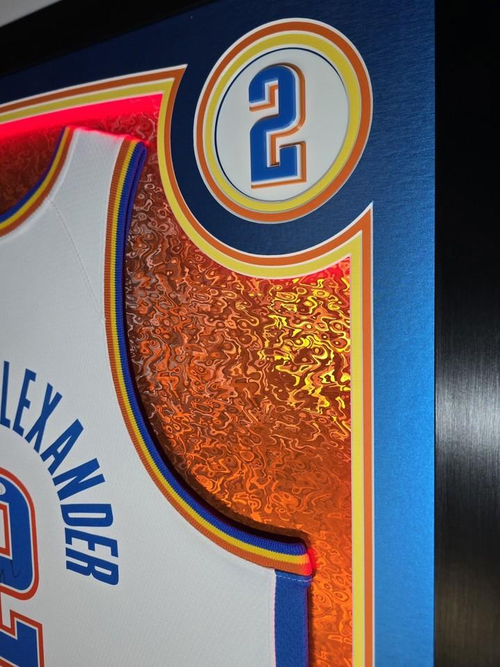 Shai Gilgeous-Alexander Signed Thunder Custom Framed Nike Jersey with LED Display & (2) PSA 10 Graded Cards (JSA) at PristineAuction.com Shai Gilgeous-Alexander Signed Thunder Custom Framed Nike Jersey with LED Display & (2) PSA 10 Graded Cards (JSA) at PristineAuction.com