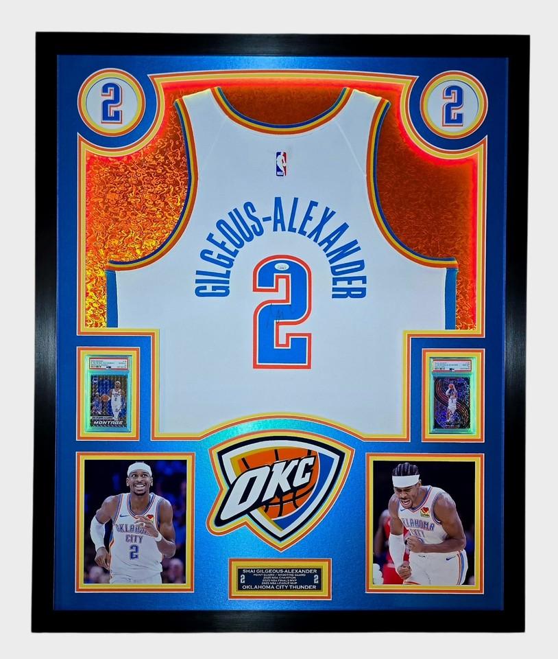 Shai Gilgeous-Alexander Signed Thunder Custom Framed Nike Jersey with LED Display & (2) PSA 10 Graded Cards (JSA) at PristineAuction.com Shai Gilgeous-Alexander Signed Thunder Custom Framed Nike Jersey with LED Display & (2) PSA 10 Graded Cards (JSA) at PristineAuction.com