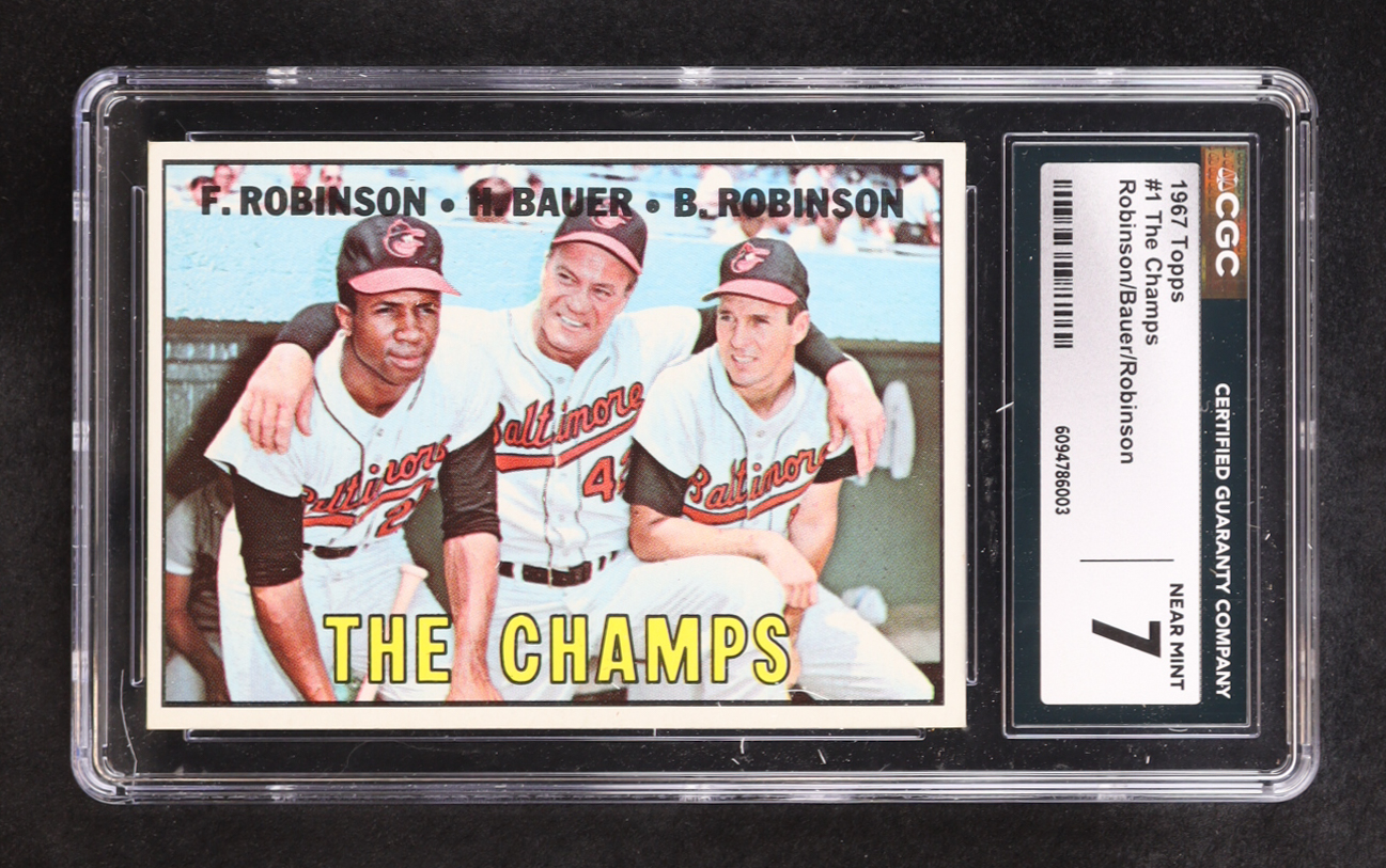 Frank Robinson / Hank Bauer MG / Brooks Robinson 1967 Topps #1 The Champs DP (CGC 7) at PristineAuction.com Frank Robinson / Hank Bauer MG / Brooks Robinson 1967 Topps #1 The Champs DP (CGC 7) at PristineAuction.com