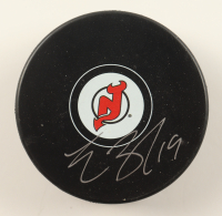 Travis Zajac Signed Devils Logo Hockey Puck (Beckett) at PristineAuction.com