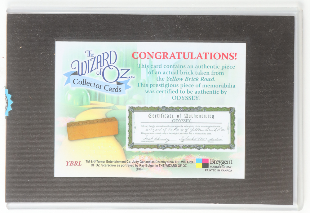 "The Wizard of Oz" LE Breygent 7x10.5 Custom Matted Card with Piece of Yellow Brick Road (Breygent) at PristineAuction.com "The Wizard of Oz" LE Breygent 7x10.5 Custom Matted Card with Piece of Yellow Brick Road (Breygent) at PristineAuction.com