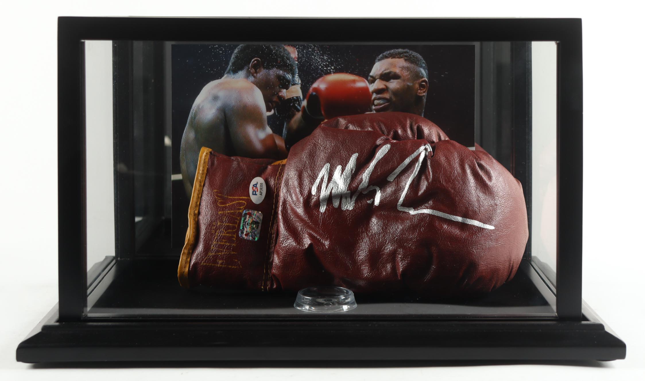 Mike Tyson Signed Vintage Everlast Boxing Glove with Photo-back Wood Display Case (Tyson & PSA) at PristineAuction.com Mike Tyson Signed Vintage Everlast Boxing Glove with Photo-back Wood Display Case (Tyson & PSA) at PristineAuction.com