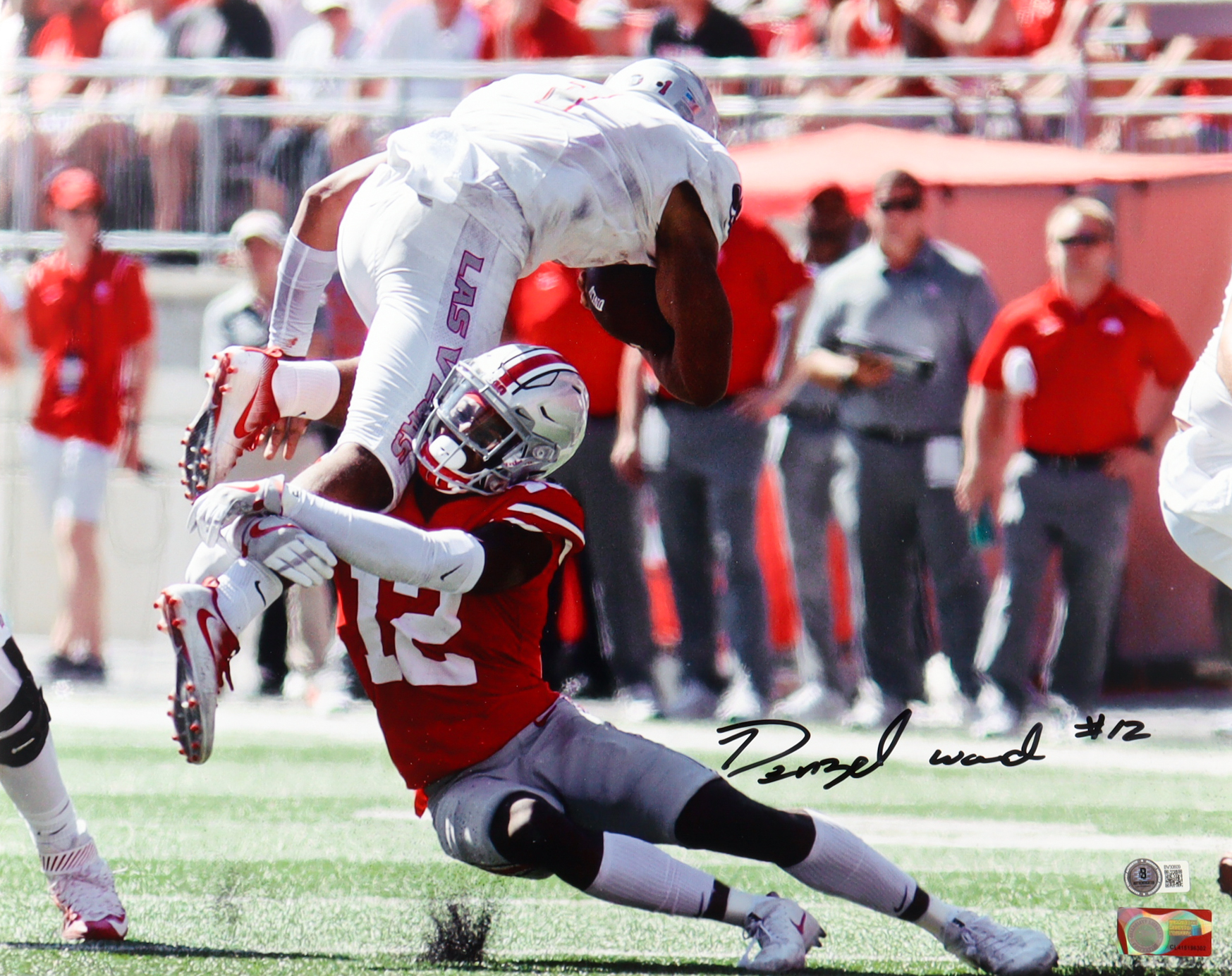 Denzel Ward Signed Ohio State Buckeyes 16x20 Photo (Beckett) at PristineAuction.com Denzel Ward Signed Ohio State Buckeyes 16x20 Photo (Beckett) at PristineAuction.com