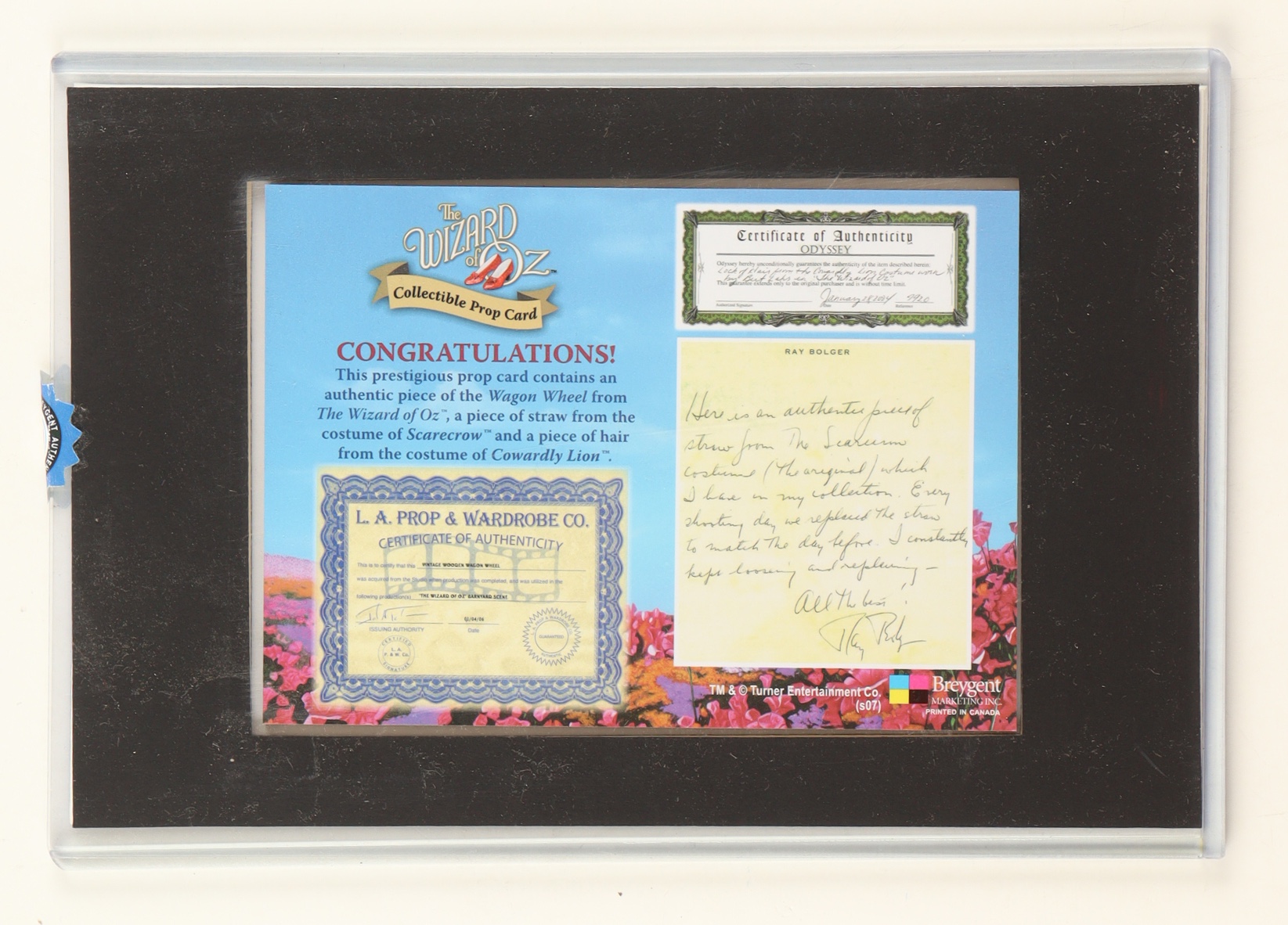 The Wizard Of Oz LE Collectible Wheel, Straw & Hair Prop Card (Breygent) at PristineAuction.com The Wizard Of Oz LE Collectible Wheel, Straw & Hair Prop Card (Breygent) at PristineAuction.com