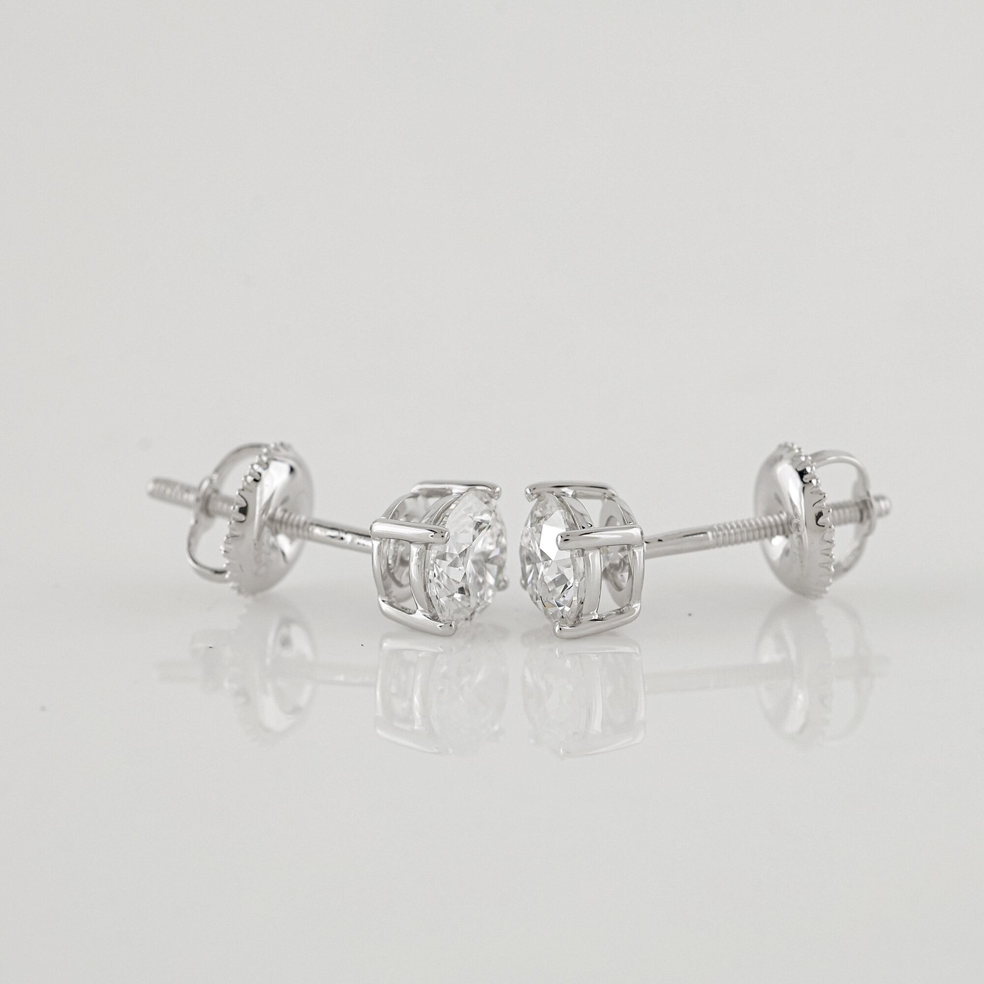 1.08 CTW Lab Grown Diamonds Earring Mounted In Sterling Silver E-F, VVS2 | Estimated Retail Value: $3,260 (IGI) at PristineAuction.com 1.08 CTW Lab Grown Diamonds Earring Mounted In Sterling Silver E-F, VVS2 | Estimated Retail Value: $3,260 (IGI) at PristineAuction.com