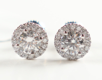 1.28 CTW Pair of Lab Grown Diamonds Earrings Mounted In Sterling Silver E-F, VVS2 | Estimated Retail Value: $3,485 at PristineAuction.com