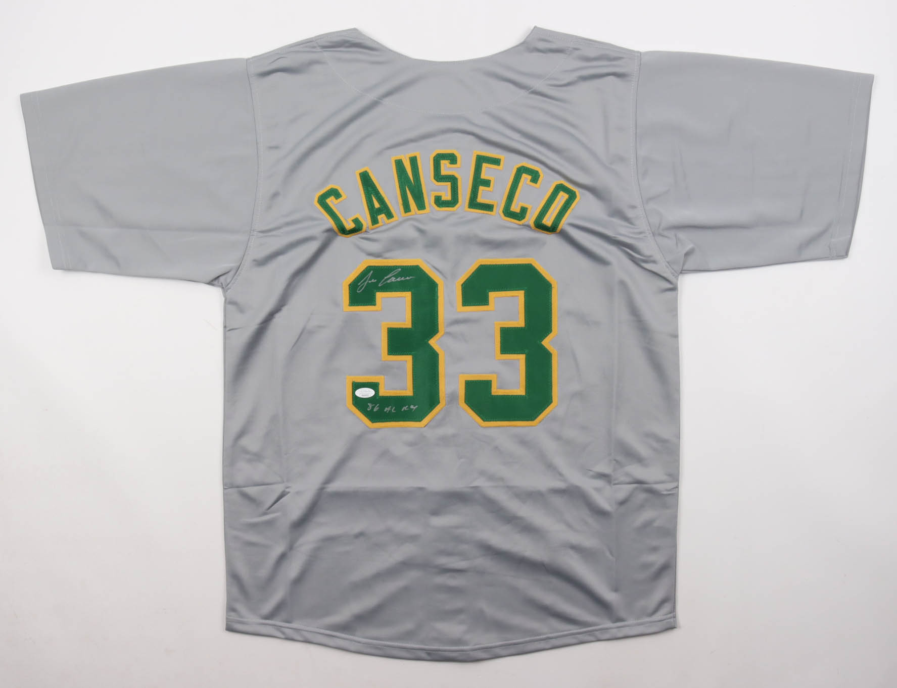 Jose Canseco Signed Jersey Inscribed "86 AL ROY" (JSA) at PristineAuction.com Jose Canseco Signed Jersey Inscribed "86 AL ROY" (JSA) at PristineAuction.com