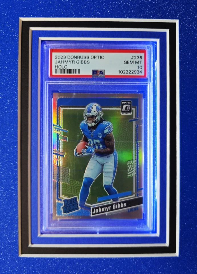 Jahmyr Gibbs Signed Lions Custom Framed Nike Jersey Inscribed "Sonic" with LED Display & (2) PSA 10 Graded Rookie Cards (Fanatics) at PristineAuction.com Jahmyr Gibbs Signed Lions Custom Framed Nike Jersey Inscribed "Sonic" with LED Display & (2) PSA 10 Graded Rookie Cards (Fanatics) at PristineAuction.com