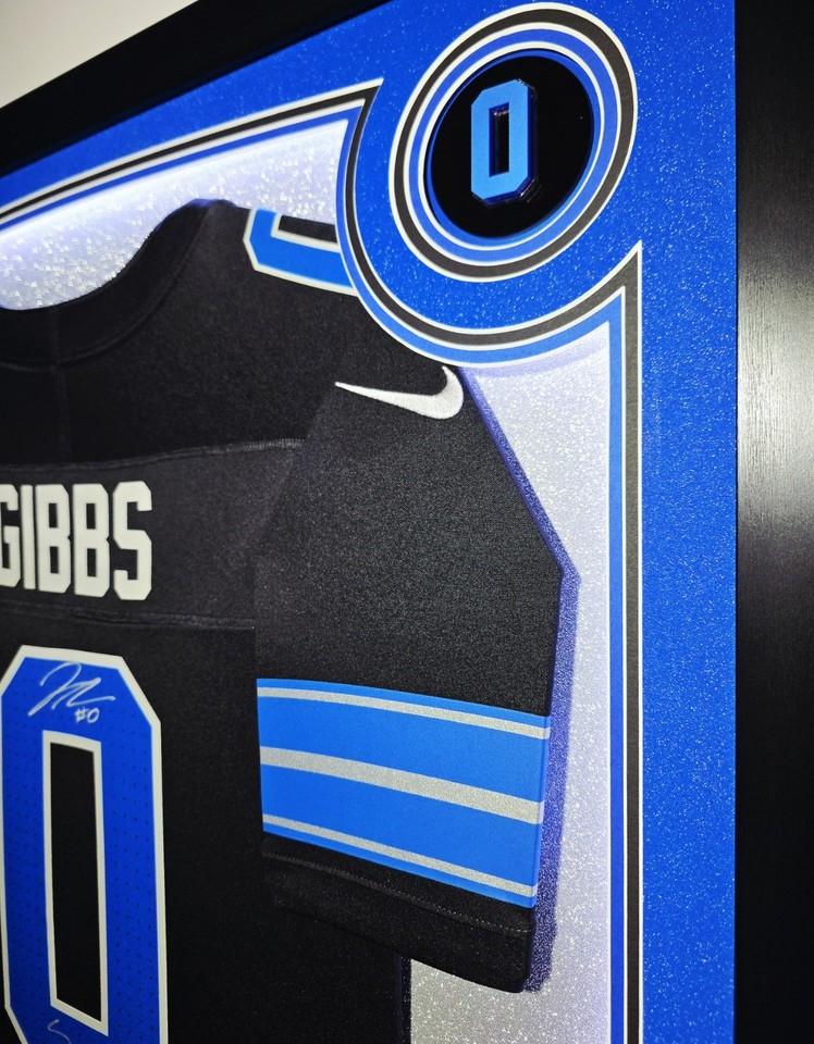 Jahmyr Gibbs Signed Lions Custom Framed Nike Jersey Inscribed "Sonic" with LED Display & (2) PSA 10 Graded Rookie Cards (Fanatics) at PristineAuction.com Jahmyr Gibbs Signed Lions Custom Framed Nike Jersey Inscribed "Sonic" with LED Display & (2) PSA 10 Graded Rookie Cards (Fanatics) at PristineAuction.com