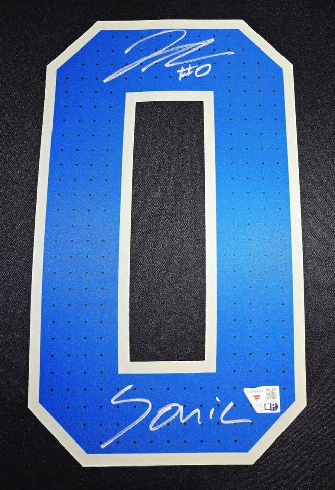 Jahmyr Gibbs Signed Lions Custom Framed Nike Jersey Inscribed "Sonic" with LED Display & (2) PSA 10 Graded Rookie Cards (Fanatics) at PristineAuction.com Jahmyr Gibbs Signed Lions Custom Framed Nike Jersey Inscribed "Sonic" with LED Display & (2) PSA 10 Graded Rookie Cards (Fanatics) at PristineAuction.com