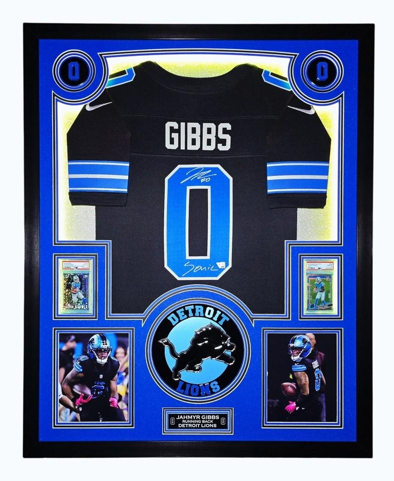 Jahmyr Gibbs Signed Lions Custom Framed Nike Jersey Inscribed "Sonic" with LED Display & (2) PSA 10 Graded Rookie Cards (Fanatics) at PristineAuction.com Jahmyr Gibbs Signed Lions Custom Framed Nike Jersey Inscribed "Sonic" with LED Display & (2) PSA 10 Graded Rookie Cards (Fanatics) at PristineAuction.com