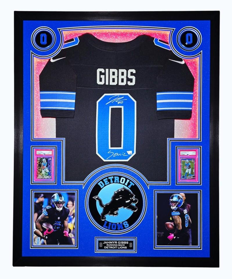 Jahmyr Gibbs Signed Lions Custom Framed Nike Jersey Inscribed "Sonic" with LED Display & (2) PSA 10 Graded Rookie Cards (Fanatics) at PristineAuction.com Jahmyr Gibbs Signed Lions Custom Framed Nike Jersey Inscribed "Sonic" with LED Display & (2) PSA 10 Graded Rookie Cards (Fanatics) at PristineAuction.com