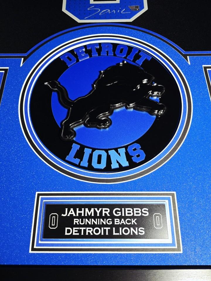 Jahmyr Gibbs Signed Lions Custom Framed Nike Jersey Inscribed "Sonic" with LED Display & (2) PSA 10 Graded Rookie Cards (Fanatics) at PristineAuction.com Jahmyr Gibbs Signed Lions Custom Framed Nike Jersey Inscribed "Sonic" with LED Display & (2) PSA 10 Graded Rookie Cards (Fanatics) at PristineAuction.com