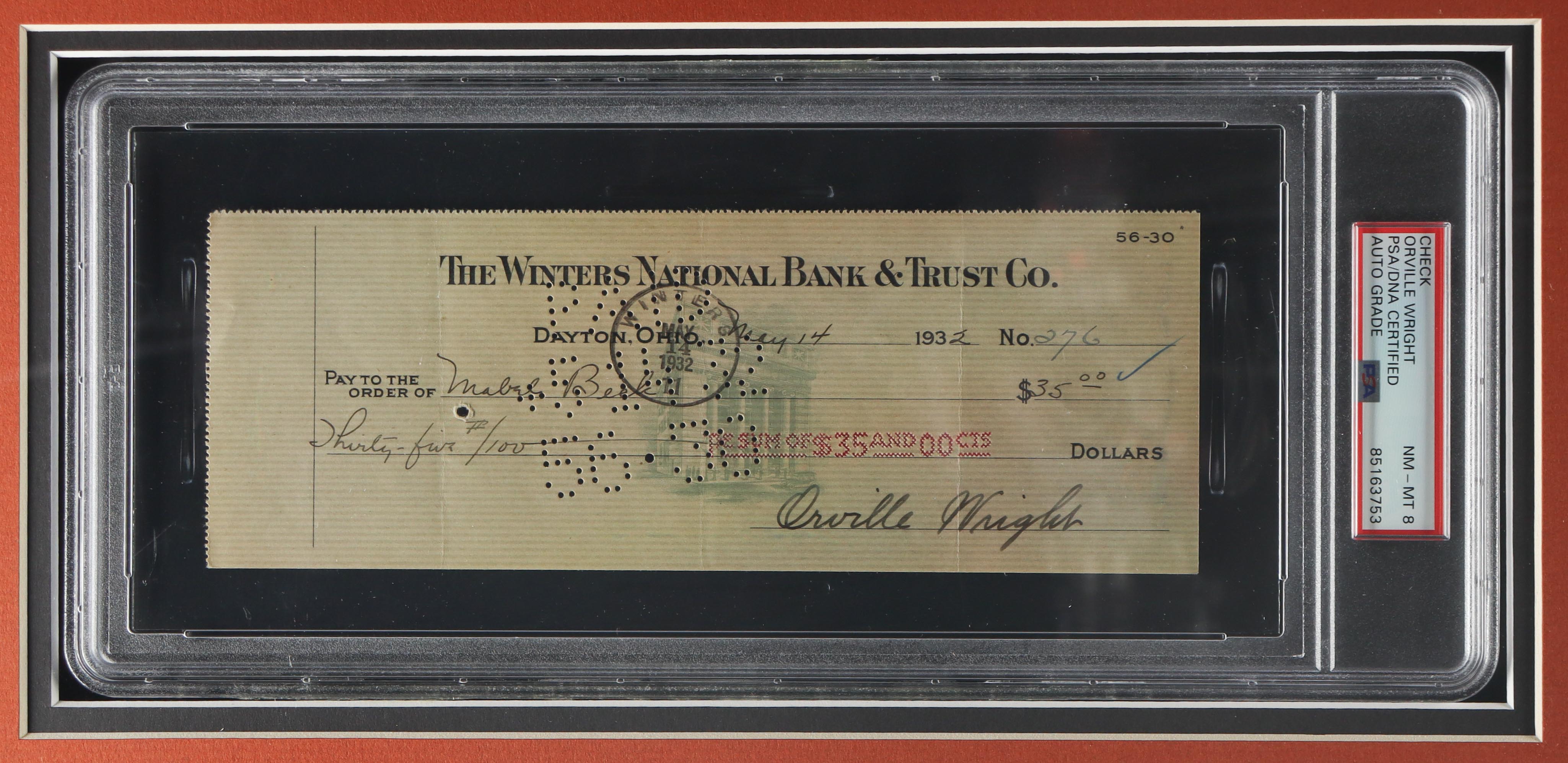 Orville Wright Signed Custom Framed 1932 Custom Framed Personal Bank Check Display (PSA | Autograph Graded 8) at PristineAuction.com Orville Wright Signed Custom Framed 1932 Custom Framed Personal Bank Check Display (PSA | Autograph Graded 8) at PristineAuction.com