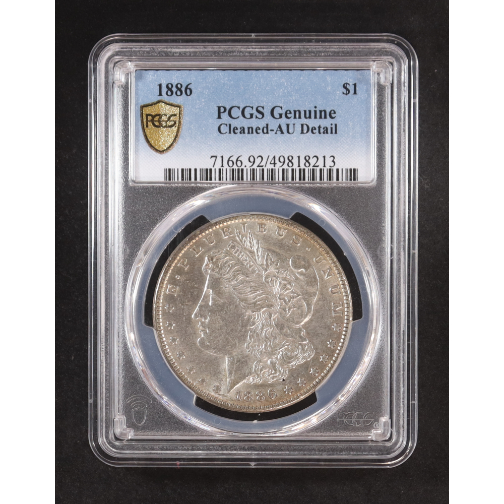 1886 Morgan Silver $1 Dollar - Gold Shield (PGCS Genuine) at PristineAuction.com