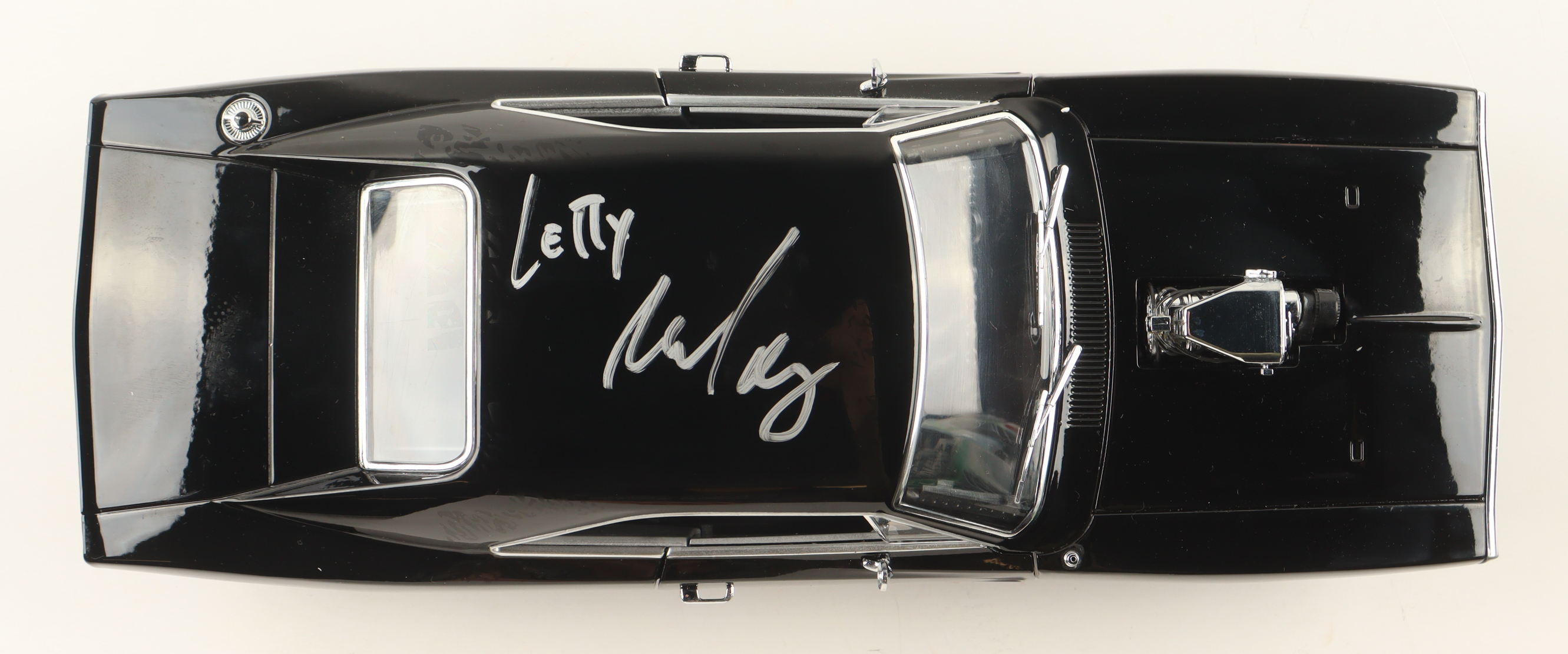 Michelle Rodriguez Signed "Fast & Furious" Dom's 1970 Dodge Charger 1:18 Scale Die-Cast Car (Celebrity Authentics) at PristineAuction.com Michelle Rodriguez Signed "Fast & Furious" Dom's 1970 Dodge Charger 1:18 Scale Die-Cast Car (Celebrity Authentics) at PristineAuction.com
