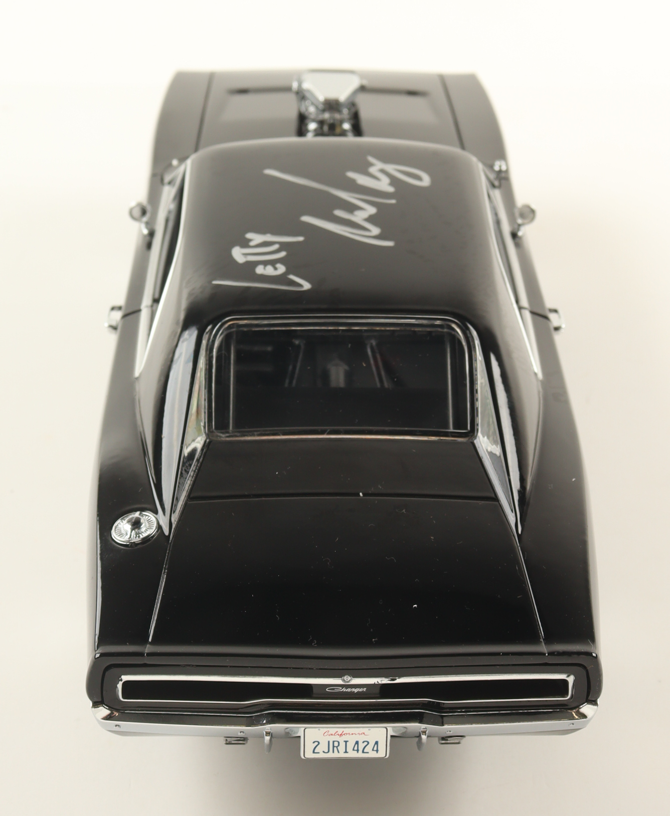 Michelle Rodriguez Signed "Fast & Furious" Dom's 1970 Dodge Charger 1:18 Scale Die-Cast Car (Celebrity Authentics) at PristineAuction.com Michelle Rodriguez Signed "Fast & Furious" Dom's 1970 Dodge Charger 1:18 Scale Die-Cast Car (Celebrity Authentics) at PristineAuction.com