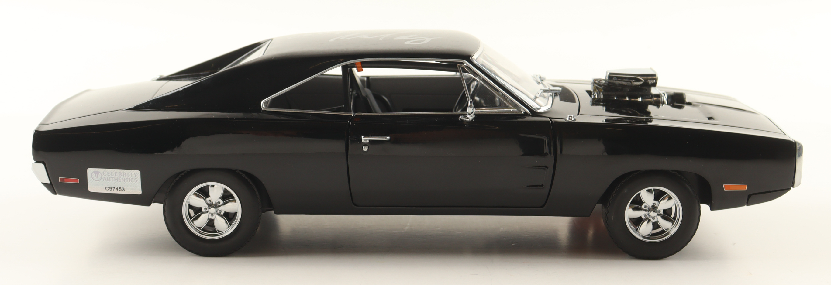 Michelle Rodriguez Signed "Fast & Furious" Dom's 1970 Dodge Charger 1:18 Scale Die-Cast Car (Celebrity Authentics) at PristineAuction.com Michelle Rodriguez Signed "Fast & Furious" Dom's 1970 Dodge Charger 1:18 Scale Die-Cast Car (Celebrity Authentics) at PristineAuction.com