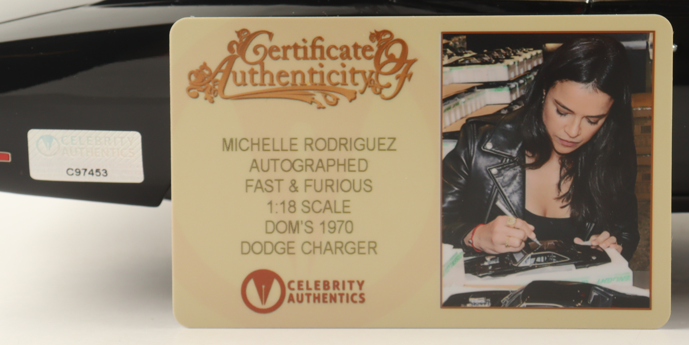 Michelle Rodriguez Signed "Fast & Furious" Dom's 1970 Dodge Charger 1:18 Scale Die-Cast Car (Celebrity Authentics) at PristineAuction.com Michelle Rodriguez Signed "Fast & Furious" Dom's 1970 Dodge Charger 1:18 Scale Die-Cast Car (Celebrity Authentics) at PristineAuction.com