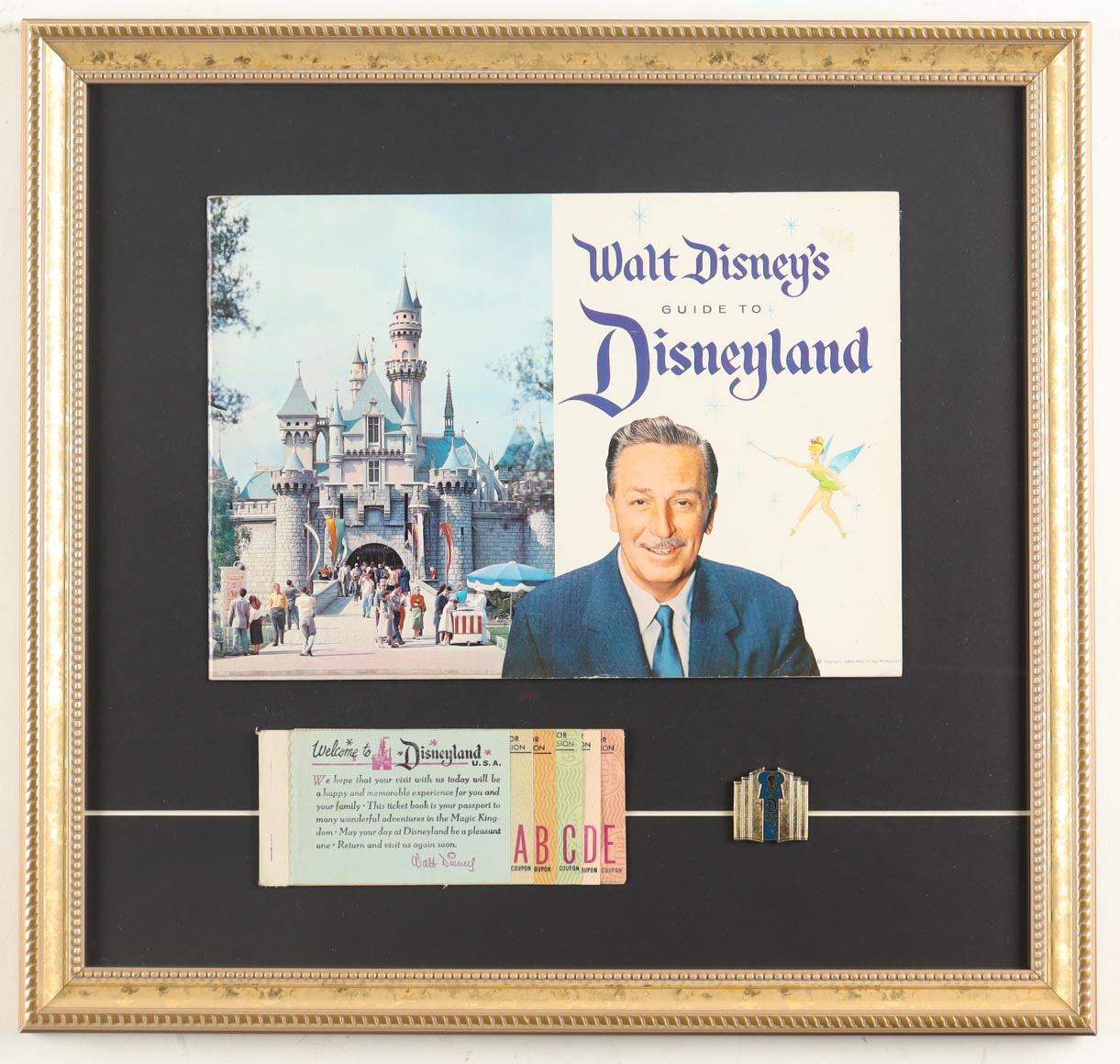 1958 "Walt Disney's Guide To Disneyland" Custom Framed Guide Display with Vintage Ticket Book & Gold Pin at PristineAuction.com 1958 "Walt Disney's Guide To Disneyland" Custom Framed Guide Display with Vintage Ticket Book & Gold Pin at PristineAuction.com