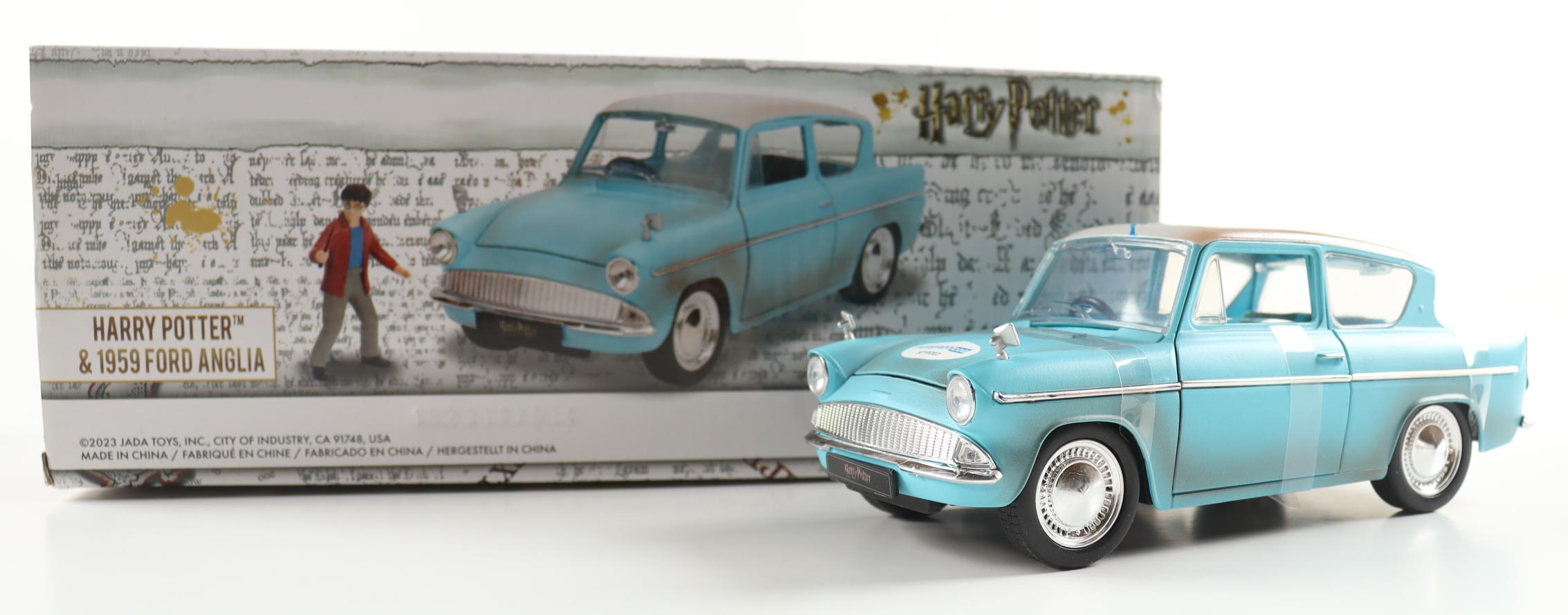 Daniel Radcliffe Signed Harry Potter 1:24 Die-Cast 1959 Ford Anglia With Harry Potter Figurine (AutographCOA) at PristineAuction.com Daniel Radcliffe Signed Harry Potter 1:24 Die-Cast 1959 Ford Anglia With Harry Potter Figurine (AutographCOA) at PristineAuction.com
