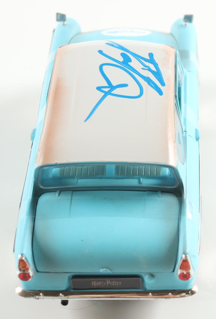 Daniel Radcliffe Signed Harry Potter 1:24 Die-Cast 1959 Ford Anglia With Harry Potter Figurine (AutographCOA) at PristineAuction.com Daniel Radcliffe Signed Harry Potter 1:24 Die-Cast 1959 Ford Anglia With Harry Potter Figurine (AutographCOA) at PristineAuction.com