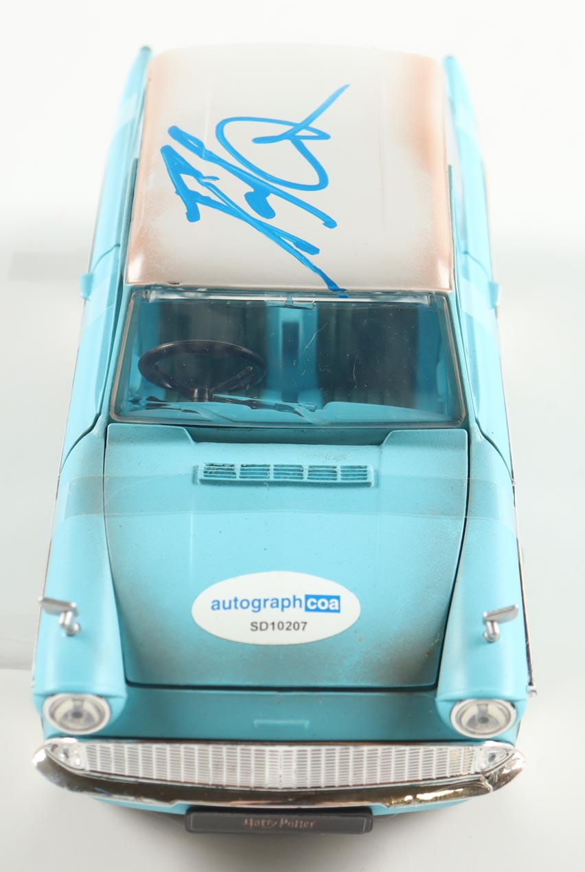 Daniel Radcliffe Signed Harry Potter 1:24 Die-Cast 1959 Ford Anglia With Harry Potter Figurine (AutographCOA) at PristineAuction.com Daniel Radcliffe Signed Harry Potter 1:24 Die-Cast 1959 Ford Anglia With Harry Potter Figurine (AutographCOA) at PristineAuction.com