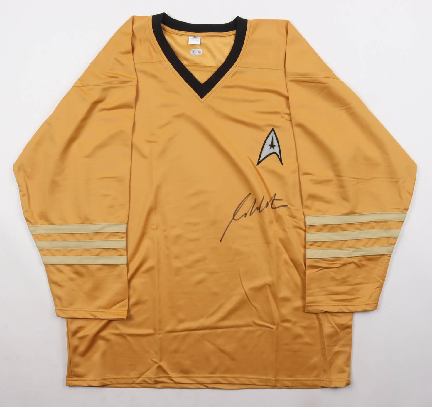 William Shatner Signed "Star Trek" Prop Replica Uniform Shirt (Beckett) at PristineAuction.com William Shatner Signed "Star Trek" Prop Replica Uniform Shirt (Beckett) at PristineAuction.com