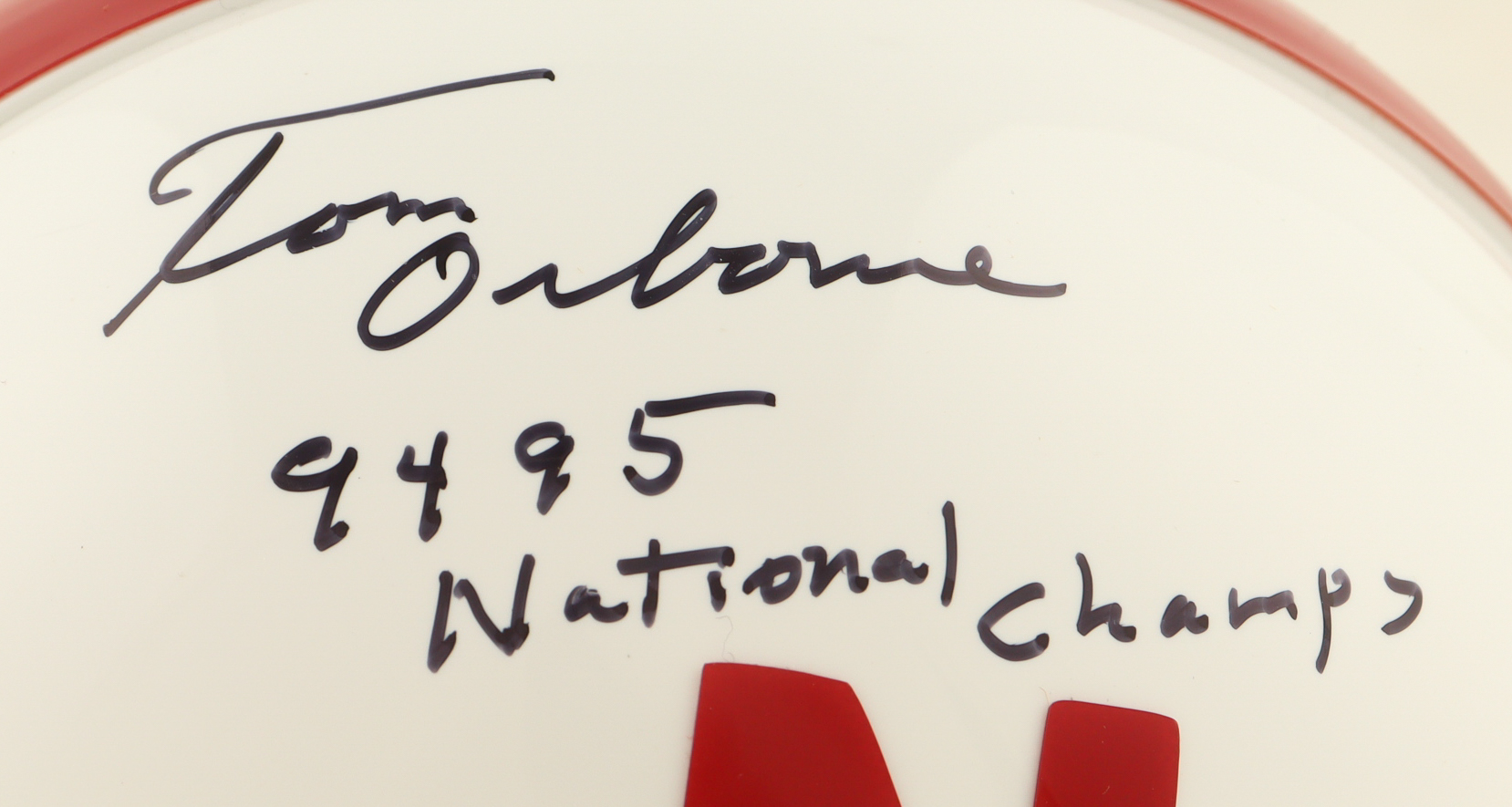 Tommie Frazier & Tom Osborne Signed Nebraska Cornhuskers Mini Helmet Inscribed "94 95 National Champs" (PSA) at PristineAuction.com Tommie Frazier & Tom Osborne Signed Nebraska Cornhuskers Mini Helmet Inscribed "94 95 National Champs" (PSA) at PristineAuction.com