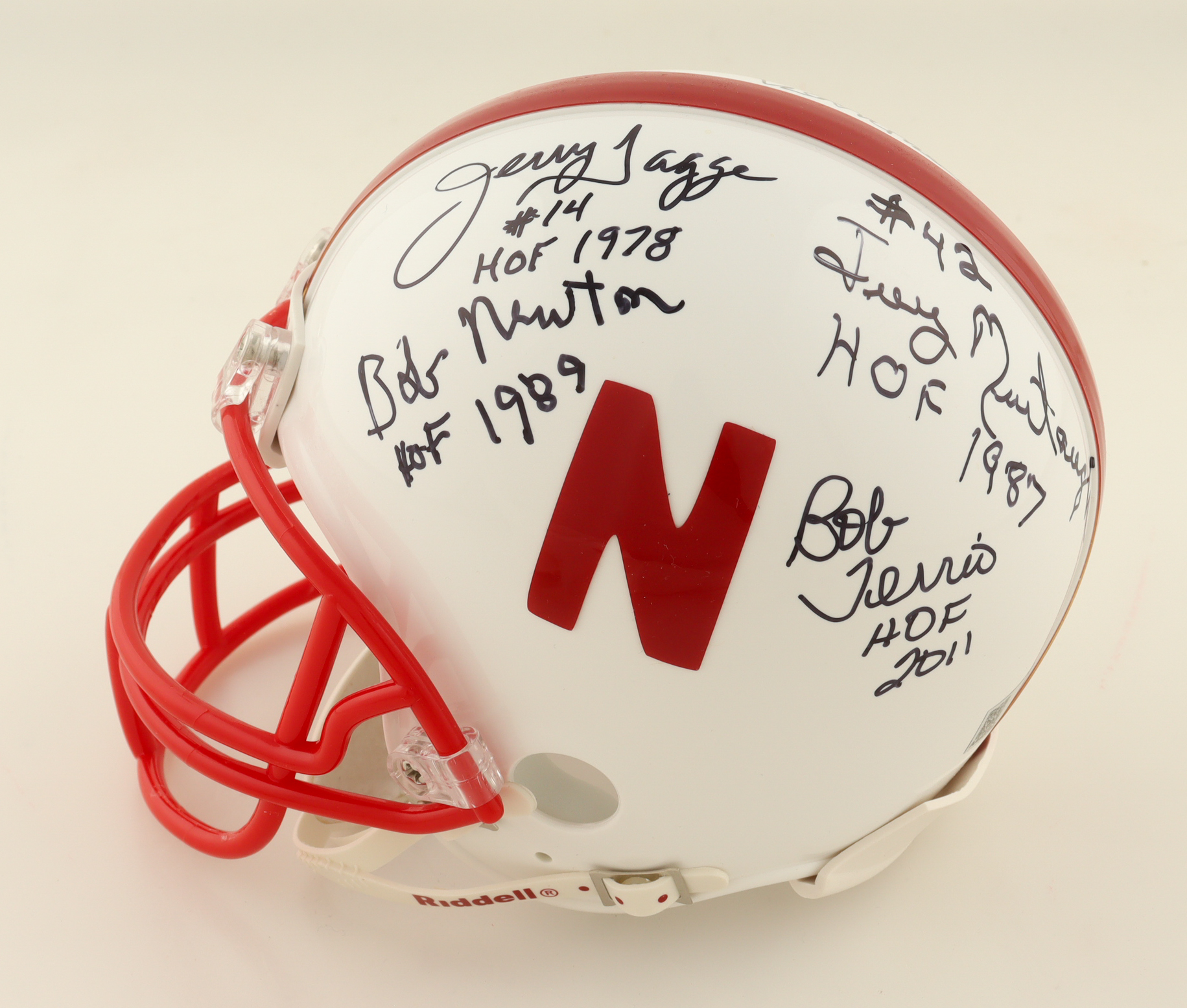 Nebraska Cornhuskers Mini Helmet Signed By (8) With Van Brownson, Dan Schneiss, Guy Ingles, Jeff Kinney With Multiple Hall Of Fame Inscriptions (AIV) at PristineAuction.com Nebraska Cornhuskers Mini Helmet Signed By (8) With Van Brownson, Dan Schneiss, Guy Ingles, Jeff Kinney With Multiple Hall Of Fame Inscriptions (AIV) at PristineAuction.com