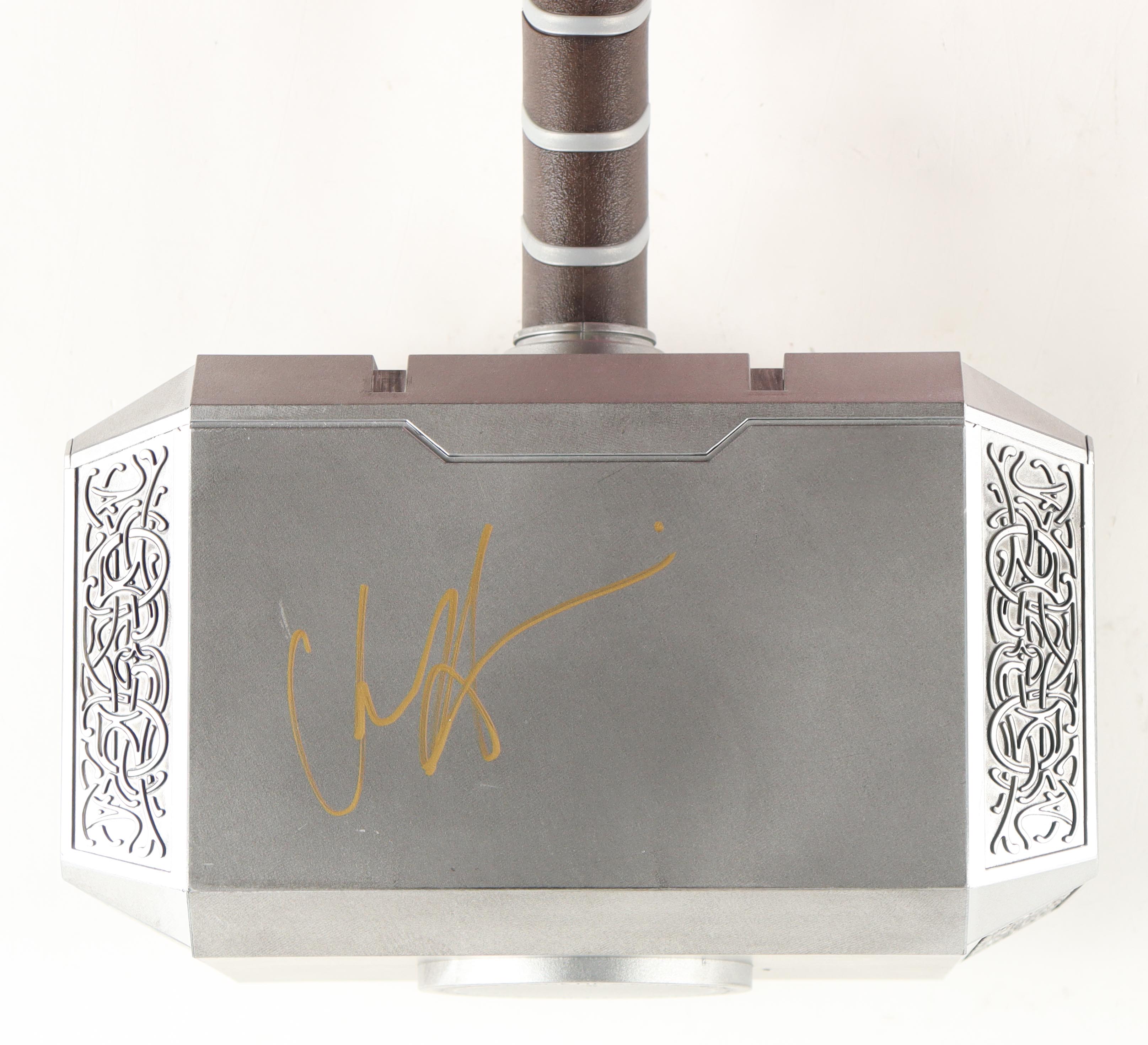 Chris Hemsworth Signed Marvel Legends Series "Thor" Mjolnir Hammer (JSA) at PristineAuction.com Chris Hemsworth Signed Marvel Legends Series "Thor" Mjolnir Hammer (JSA) at PristineAuction.com