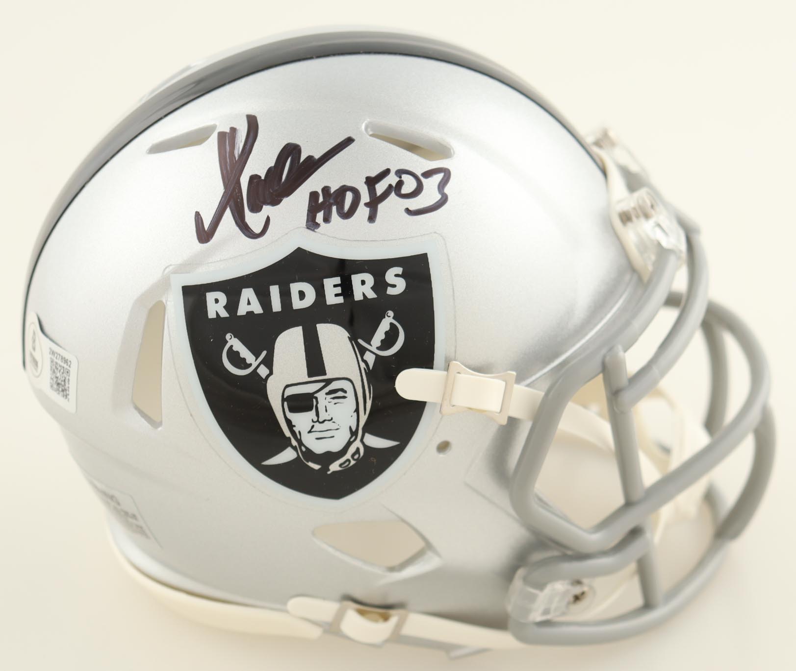 Marcus Allen Signed Custom Framed Photo Display With Raiders Speed Mini Helmet Inscribed "All The Best" & "HOF 03" (Beckett) at PristineAuction.com Marcus Allen Signed Custom Framed Photo Display With Raiders Speed Mini Helmet Inscribed "All The Best" & "HOF 03" (Beckett) at PristineAuction.com