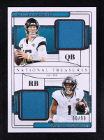 Trevor Lawrence / Travis Etienne Jr. 2024 Panini National Treasures NFL Gear Combo Materials #14 #86/99 at PristineAuction.com