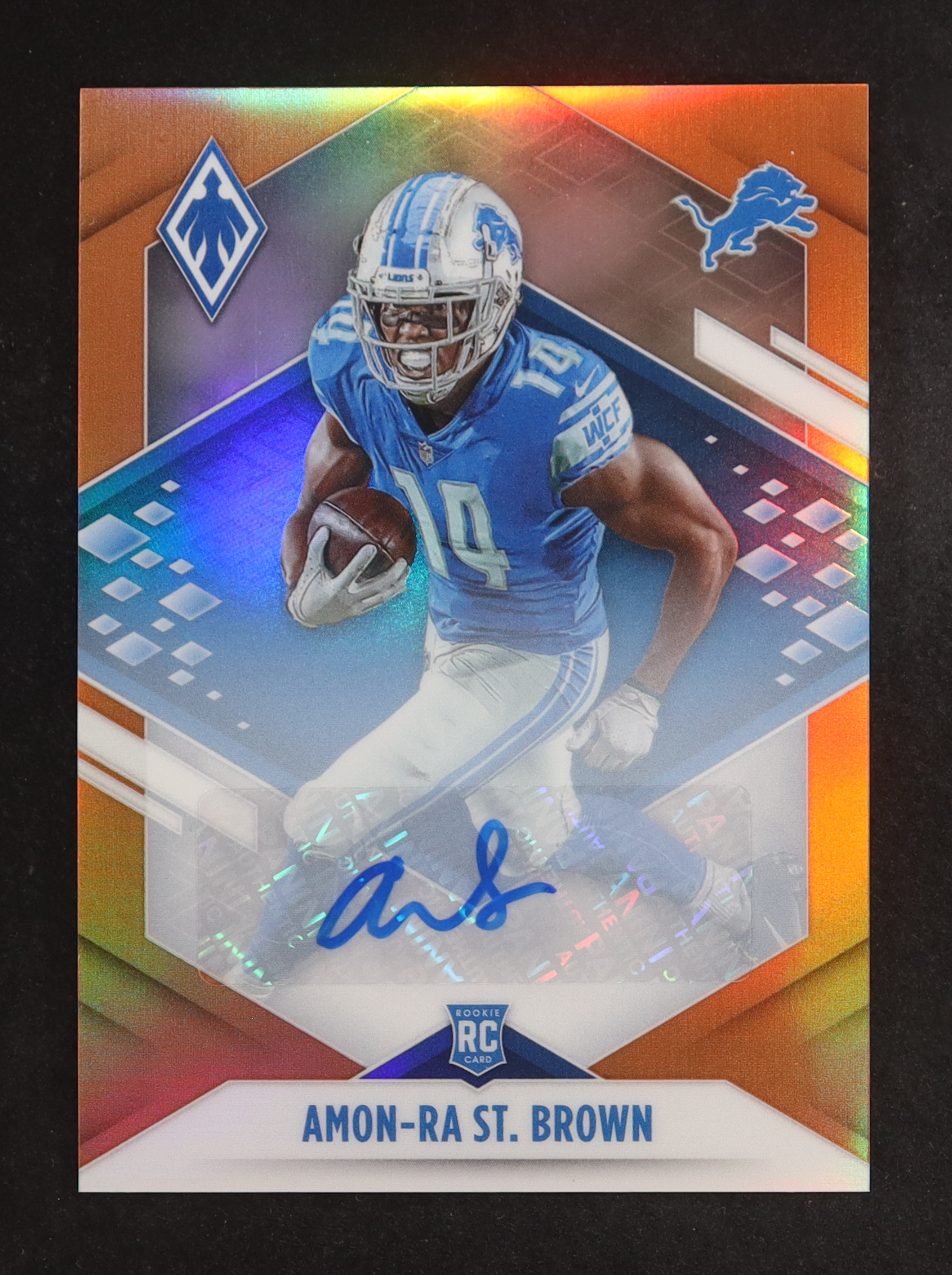 Amon-Ra St. Brown 2021 Panini Phoenix Rookie Autographs Orange #131 RC #13/25 at PristineAuction.com Amon-Ra St. Brown 2021 Panini Phoenix Rookie Autographs Orange #131 RC #13/25 at PristineAuction.com