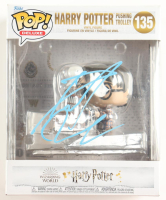 Daniel Radcliffe Signed "Wizarding World: Harry Potter" #135 Harry Potter Pushing Trolley Funko Pop! Vinyl Figure (ACOA) at PristineAuction.com