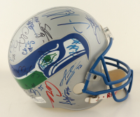 1998 Seahawks Full-Size Helmet Team-Signed By (34) With Cortez Kennedy, Warren Moon, Sam Adams, Ricky Watters (Beckett) at PristineAuction.com
