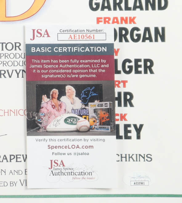 "The Wizard of Oz" 16x24 Poster Cast-Signed by (4) with Mickey Carroll, Jerry Maren, Karl Slover, & Donna Stewart Hardway with Inscriptions (JSA) at PristineAuction.com "The Wizard of Oz" 16x24 Poster Cast-Signed by (4) with Mickey Carroll, Jerry Maren, Karl Slover, & Donna Stewart Hardway with Inscriptions (JSA) at PristineAuction.com