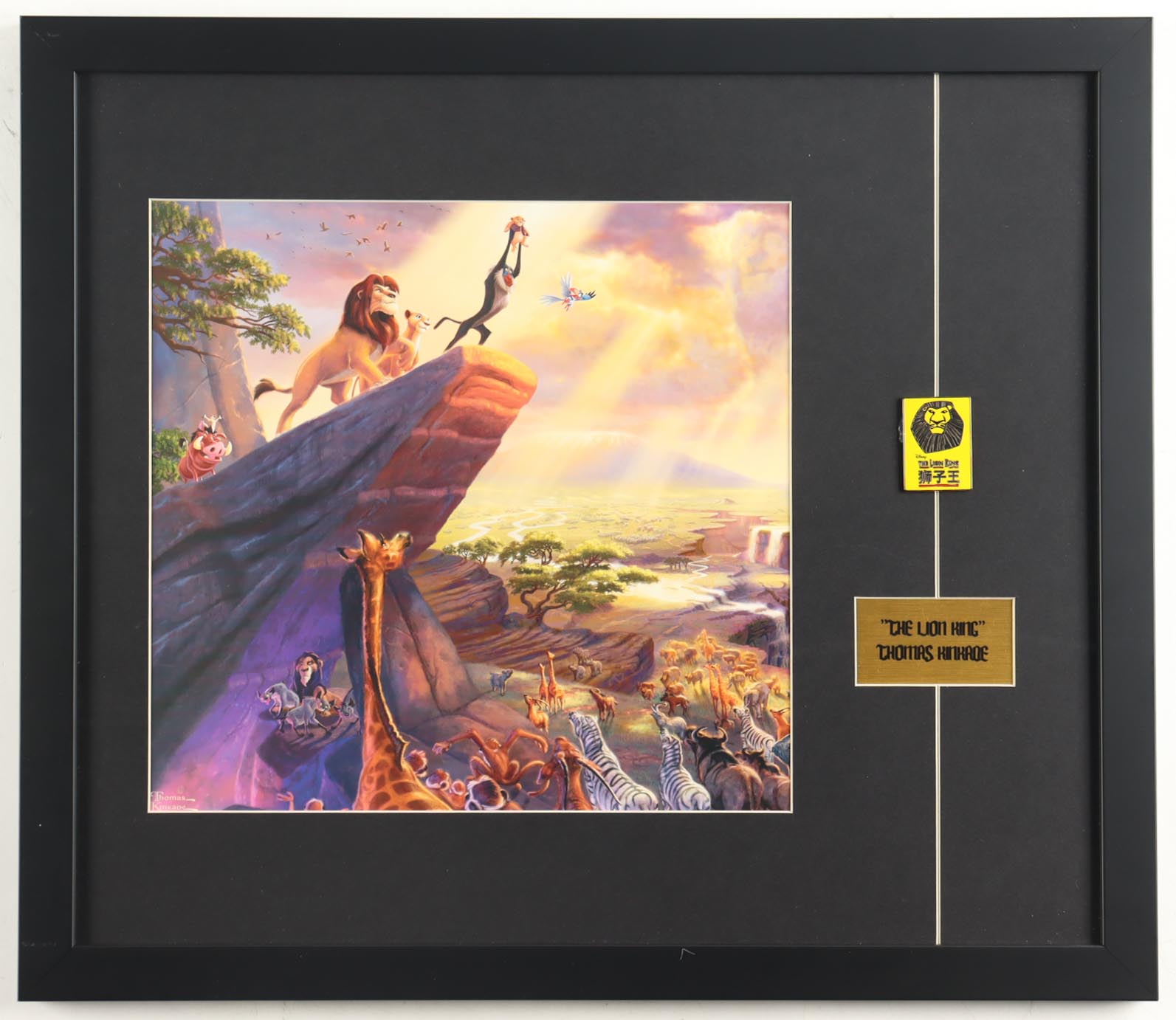 "The Lion King" Thomas Kinkade Custom Framed Art Print Display With Chinese Movie Release Pin at PristineAuction.com "The Lion King" Thomas Kinkade Custom Framed Art Print Display With Chinese Movie Release Pin at PristineAuction.com