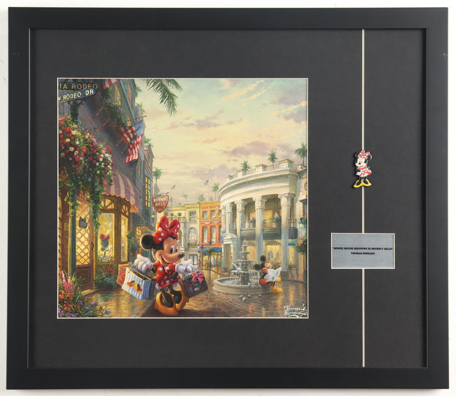 Walt Disney's "Minnie Mouse Goes Shopping In Beverly Hills" Thomas Kinkade Custom Framed Print Display with Minnie Mouse Character Pin at PristineAuction.com Walt Disney's "Minnie Mouse Goes Shopping In Beverly Hills" Thomas Kinkade Custom Framed Print Display with Minnie Mouse Character Pin at PristineAuction.com