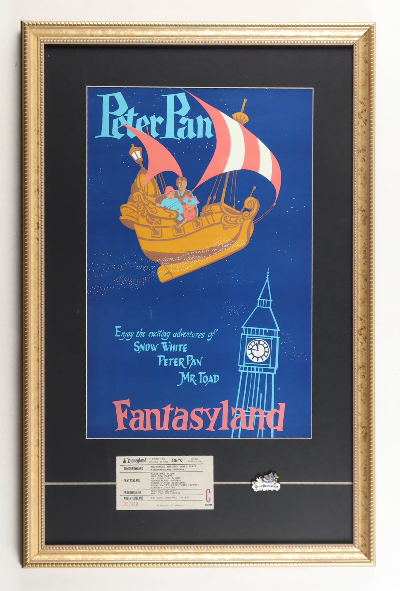 Disneyland "Peter Pan" Fantasyland Custom Framed Poster Print Display with Ride Ticket & Peter Pan Retired Pin at PristineAuction.com Disneyland "Peter Pan" Fantasyland Custom Framed Poster Print Display with Ride Ticket & Peter Pan Retired Pin at PristineAuction.com
