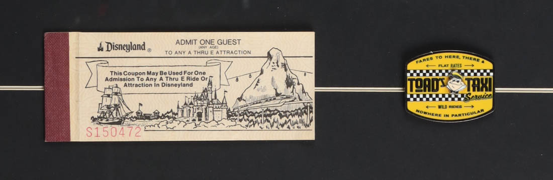 Disneyland "Mr. Toad's Wild Ride" Fantasyland Custom Framed Poster Print Display with Official Ride Pin & Disneyland Ticket Book at PristineAuction.com Disneyland "Mr. Toad's Wild Ride" Fantasyland Custom Framed Poster Print Display with Official Ride Pin & Disneyland Ticket Book at PristineAuction.com