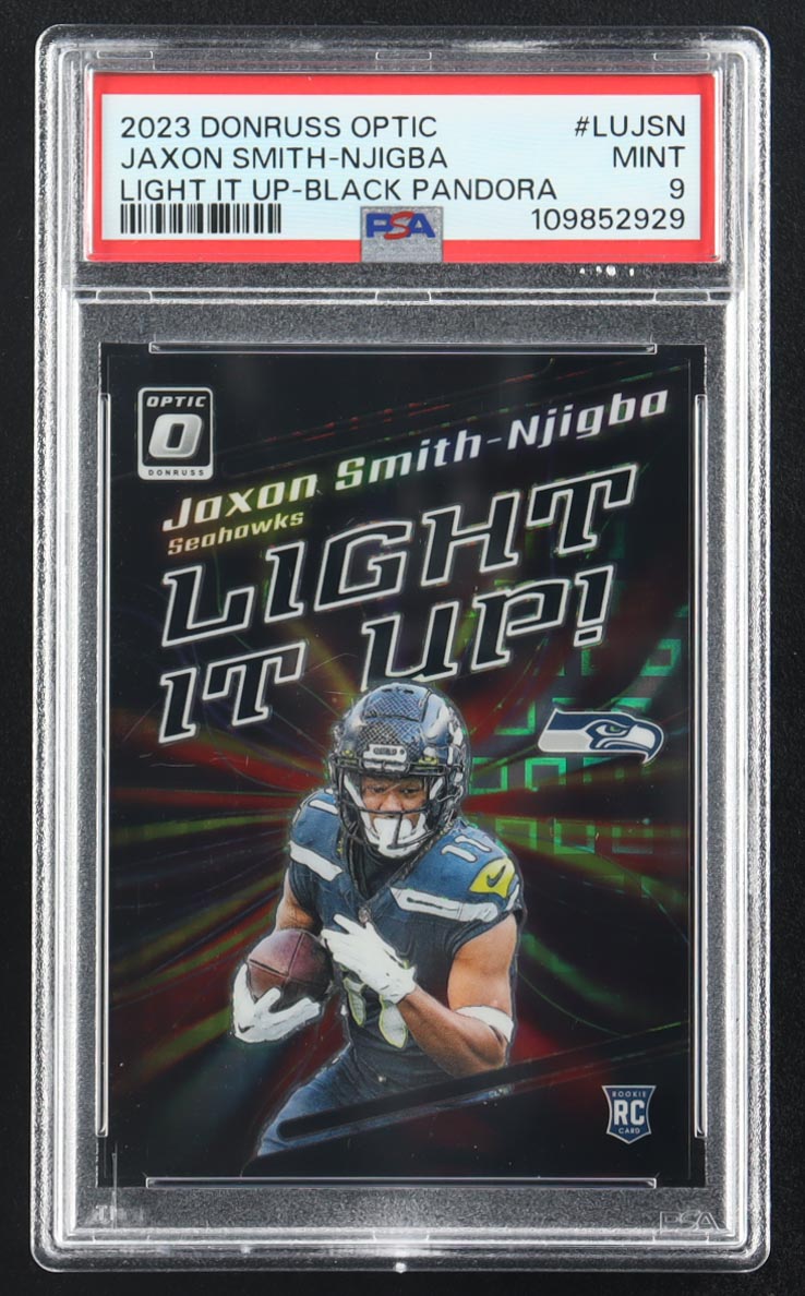 Jaxon Smith-Njigba 2023 Donruss Optic Light It Up Black Pandora #LUJSN #17/25 RC (PSA 9) at PristineAuction.com Jaxon Smith-Njigba 2023 Donruss Optic Light It Up Black Pandora #LUJSN #17/25 RC (PSA 9) at PristineAuction.com