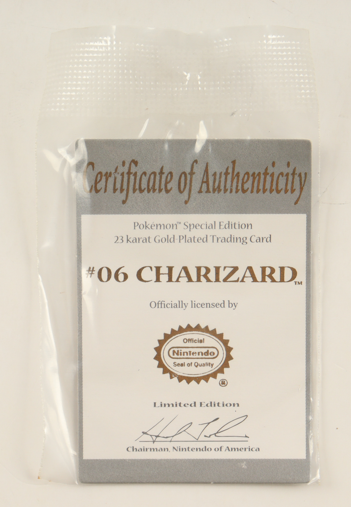 Charizard 23Kt Gold-Plated Pokemon Card with Original Packaging at PristineAuction.com Charizard 23Kt Gold-Plated Pokemon Card with Original Packaging at PristineAuction.com