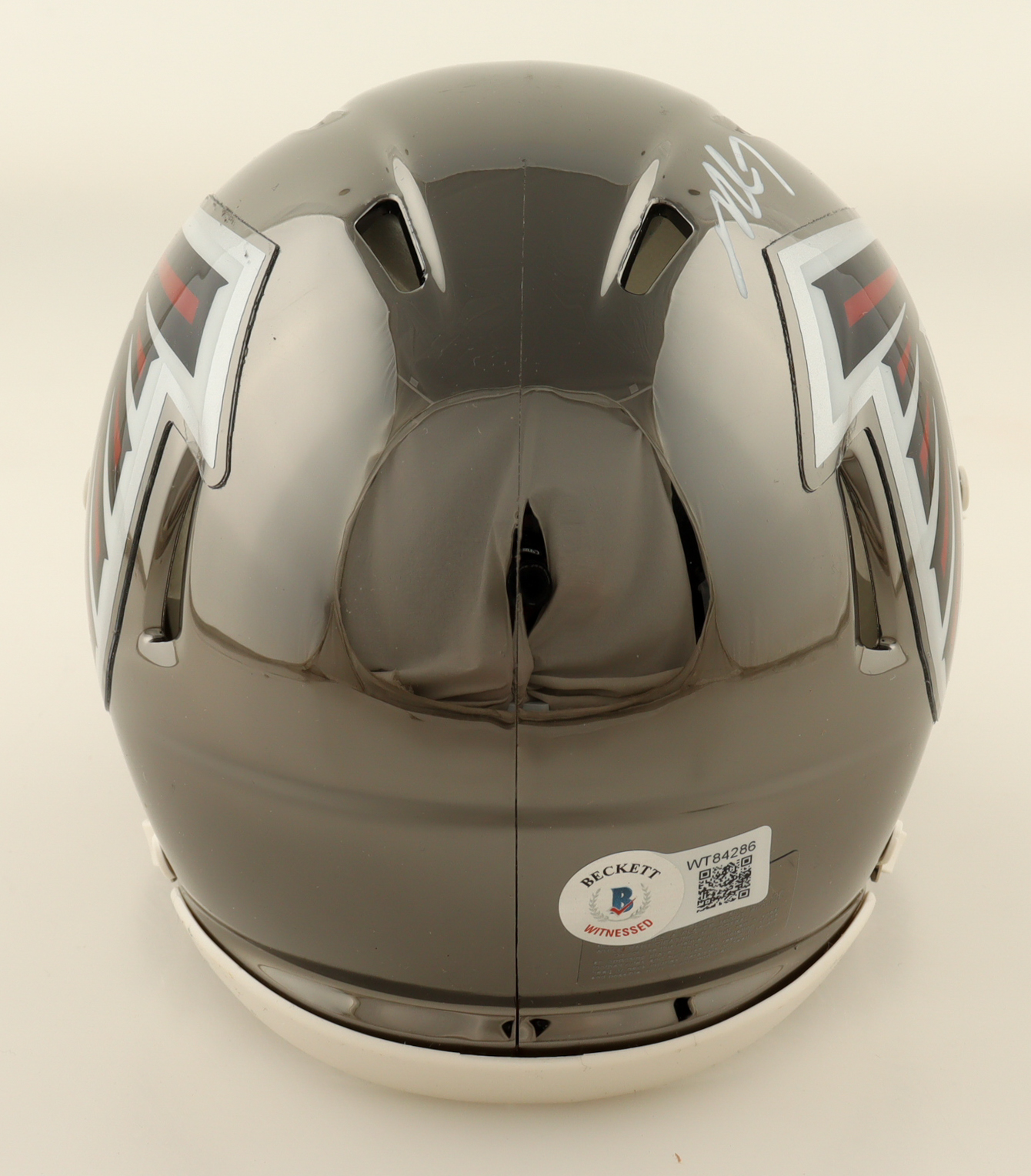 Michael Vick Signed Falcons Tide Chrome Alternate Speed Mini Helmet (Beckett) at PristineAuction.com Michael Vick Signed Falcons Tide Chrome Alternate Speed Mini Helmet (Beckett) at PristineAuction.com