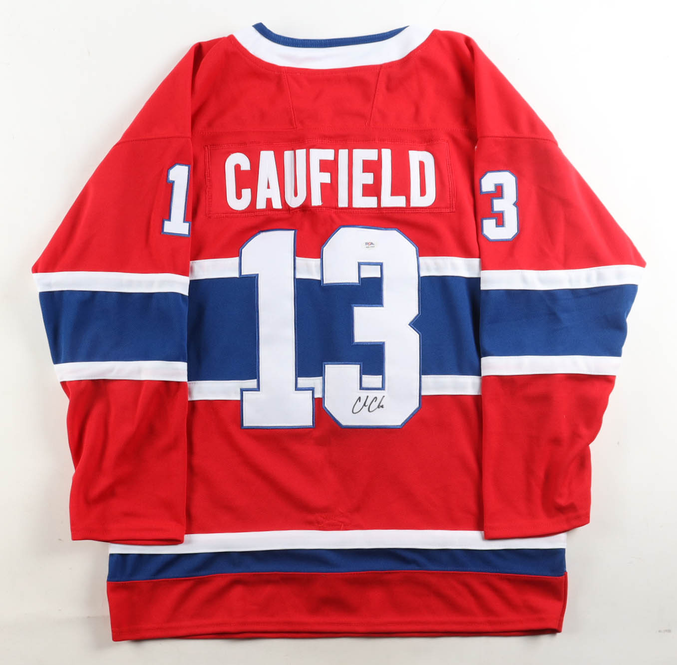 Cole Caufield Signed Jersey (PSA) at PristineAuction.com Cole Caufield Signed Jersey (PSA) at PristineAuction.com